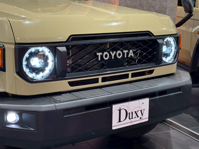 ランドクルーザー７０ ＡＸ　アルパインディスプレイオーディオ　ＨＤＭＩ端子　純正ＥＴＣ　純正バイザー　ＬＥＤヘッドライト　ウッドコンビステアリング　クルーズコントロール　バックカメラ　ヘッドライトレベライザー　アルミホイール（6枚目）
