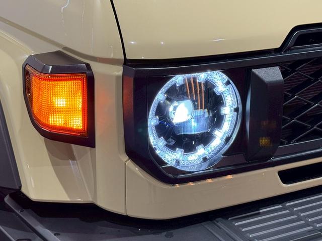 ランドクルーザー７０ ＡＸ　アルパインディスプレイオーディオ　ＨＤＭＩ端子　純正ＥＴＣ　純正バイザー　ＬＥＤヘッドライト　ウッドコンビステアリング　クルーズコントロール　バックカメラ　ヘッドライトレベライザー　アルミホイール（13枚目）