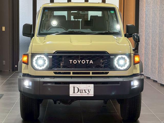 ランドクルーザー７０ ＡＸ　アルパインディスプレイオーディオ　ＨＤＭＩ端子　純正ＥＴＣ　純正バイザー　ＬＥＤヘッドライト　ウッドコンビステアリング　クルーズコントロール　バックカメラ　ヘッドライトレベライザー　アルミホイール（19枚目）