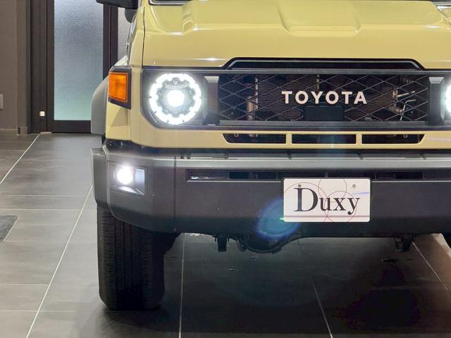 ランドクルーザー７０ ＡＸ　アルパインディスプレイオーディオ　ＨＤＭＩ端子　純正ＥＴＣ　純正バイザー　ＬＥＤヘッドライト　ウッドコンビステアリング　クルーズコントロール　バックカメラ　ヘッドライトレベライザー　アルミホイール（21枚目）