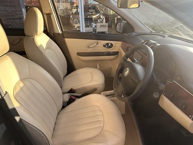 ビュート １２ＳＴ　ワンオーナー　自社オリジナルＲｅｍｉｃ　ＯＰカラー　本革Ｓ　カラードドアトリム（アイボリー）　本革Ｓ　クラシックインパネ（ココア）　クラシックセンターコンソール　社外ＳＤナビ＋フルセグＴＶ　取説（26枚目）