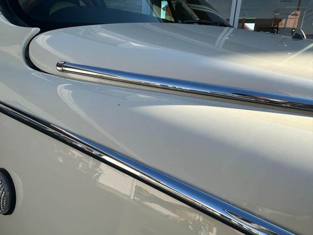 ビュート コンバーチブル　クーペコンバーチブル　電動Ｏ・Ｐ　社外新品幌　黒内装　木目調インパネ　社外新品ウッドステアリング　レザー調Ｓ　社外新品ＳＤナビ＋フルセグＴＶ　バックカメラ　ＥＴＣ　社外新品キーレス　取説　保証書（18枚目）