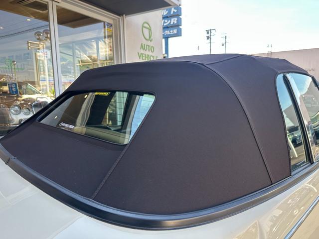 ビュート コンバーチブル　クーペコンバーチブル　電動Ｏ・Ｐ　社外新品幌　黒内装　木目調インパネ　社外新品ウッドステアリング　レザー調Ｓ　社外新品ＳＤナビ＋フルセグＴＶ　バックカメラ　ＥＴＣ　社外新品キーレス　取説　保証書（19枚目）