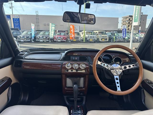 ビュート コンバーチブル　クーペコンバーチブル　電動Ｏ・Ｐ　社外新品幌　黒内装　木目調インパネ　社外新品ウッドステアリング　レザー調Ｓ　社外新品ＳＤナビ＋フルセグＴＶ　バックカメラ　ＥＴＣ　社外新品キーレス　取説　保証書（31枚目）