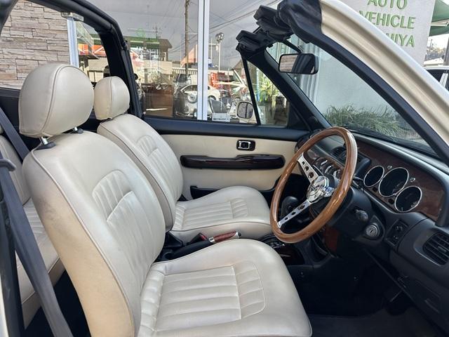 ビュート コンバーチブル　クーペコンバーチブル　電動Ｏ・Ｐ　社外新品幌　黒内装　木目調インパネ　社外新品ウッドステアリング　レザー調Ｓ　社外新品ＳＤナビ＋フルセグＴＶ　バックカメラ　ＥＴＣ　社外新品キーレス　取説　保証書（33枚目）