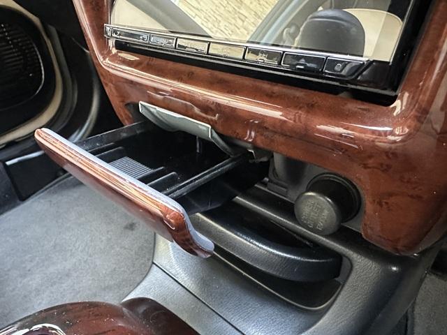 ビュート コンバーチブル　クーペコンバーチブル　電動Ｏ・Ｐ　社外新品幌　黒内装　木目調インパネ　社外新品ウッドステアリング　レザー調Ｓ　社外新品ＳＤナビ＋フルセグＴＶ　バックカメラ　ＥＴＣ　社外新品キーレス　取説　保証書（52枚目）