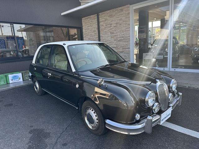 ビュート 　１．３ＤＸ　ＡＢＳ　助手席Ａ／Ｂ　レザー調Ｓ　木目調インパネ　社外新品ウッドステアリング　社外ＳＤナビ＋フルセグＴＶ　バックカメラ　ＥＴＣ　社外新品メッキフェンダーミラー　ＵＥＢケーブル　キーレス（3枚目）