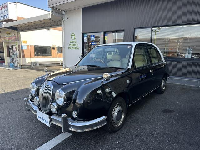 ビュート 　１．３ＤＸ　ＡＢＳ　助手席Ａ／Ｂ　レザー調Ｓ　木目調インパネ　社外新品ウッドステアリング　社外ＳＤナビ＋フルセグＴＶ　バックカメラ　ＥＴＣ　社外新品メッキフェンダーミラー　ＵＥＢケーブル　キーレス（9枚目）