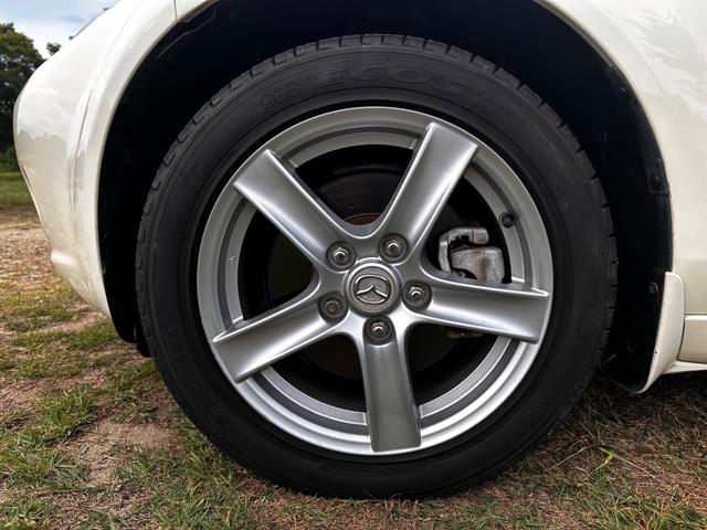 ロードスター VS ボディーコーティング済み 地デジTV バックカメラ オープンカー 社外ナビ 茶革シート シートヒーター パドルシフト スマートキー ETC HIDヘッドライト オートエアコン 16インチAW(52枚目)