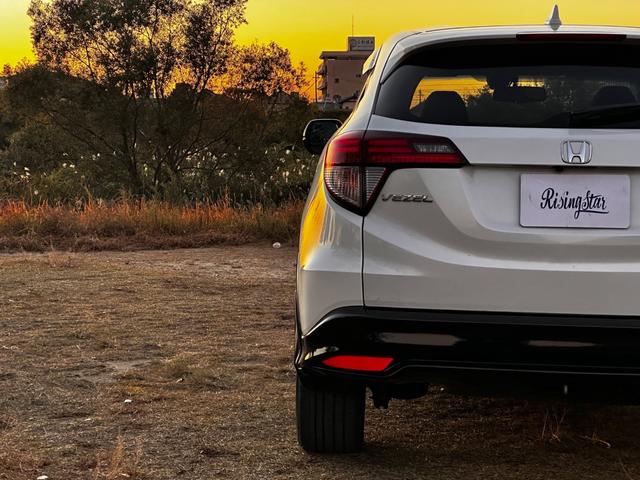 ヴェゼル ハイブリッドＲＳ・ホンダセンシング　ボディーコーティング済み　リア修復　Ｂｌｕｅｔｏｏｔｈ　地デジＴＶ　パドルシフト　ハーフレザーシート　バックカメラ　ＬＥＤヘッドライト　純正ナビ　禁煙車　シートヒーター　ＥＴＣ（23枚目）