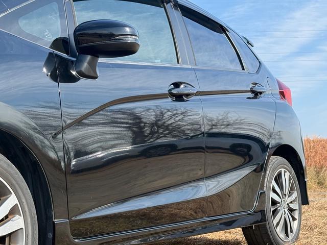 フィット 　６ＭＴ　ボディーコーティング済み　Ｂｌｕｅｔｏｏｔｈ　地デジフルセグＴＶ　バックカメラ　ＣＤ　純正１６インチアルミホイール　オートクルーズコントロール　オートエアコン　プッシュスタート　横滑り防止装置（32枚目）