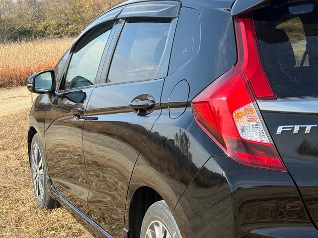 フィット 　６ＭＴ　ボディーコーティング済み　Ｂｌｕｅｔｏｏｔｈ　地デジフルセグＴＶ　バックカメラ　ＣＤ　純正１６インチアルミホイール　オートクルーズコントロール　オートエアコン　プッシュスタート　横滑り防止装置（34枚目）