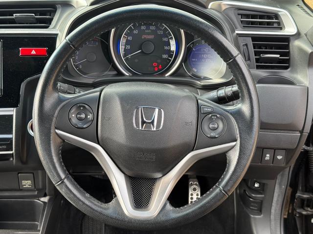 フィット 　６ＭＴ　ボディーコーティング済み　Ｂｌｕｅｔｏｏｔｈ　地デジフルセグＴＶ　バックカメラ　ＣＤ　純正１６インチアルミホイール　オートクルーズコントロール　オートエアコン　プッシュスタート　横滑り防止装置（66枚目）