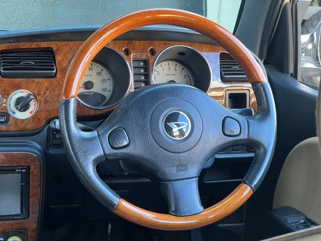 ミラジーノ ジーノ　ユーザー買取車／４ＡＴ車両／ベージュ全塗装／ウッドコンビハンドル／ウッド調パネル／ミニライト製１４インチアルミホイール／ｃａｒｒｏｚｚｅｒｉａ２Ｄオーディオ／ワンセグＴＶ／ＣＤ・ＤＶＤ／ＥＴＣ（21枚目）