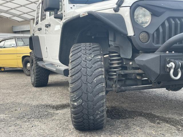 ジープ・ラングラーアンリミテッド サハラ Rugged Ridgeアイアンバンパー JAOS2インチリフトアップ キット FUEL17インチアルミ オーバーフェンダー ナビ フルセグTV バック・サイドカメラ ETC 純正サブウーハー(24枚目)