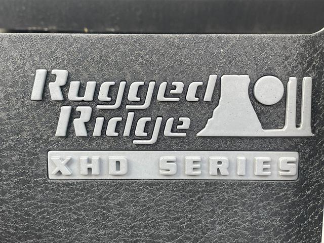 ジープ・ラングラーアンリミテッド サハラ Rugged Ridgeアイアンバンパー JAOS2インチリフトアップ キット FUEL17インチアルミ オーバーフェンダー ナビ フルセグTV バック・サイドカメラ ETC 純正サブウーハー(26枚目)