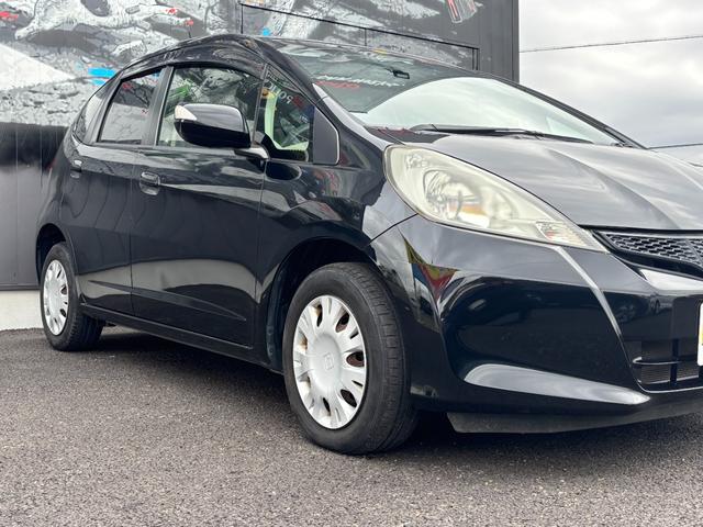 フィット 13G・スマートセレクション ファインスタイル 1年保証付 純正ナビ HIDヘッド 1オーナー車 地デジTV リアカメラ ビルトインETC 前後ドラレコ スマートキー オートライト 電格ミラー 運転席アームレスト ステアリングスイッチ 取説・保証書(17枚目)