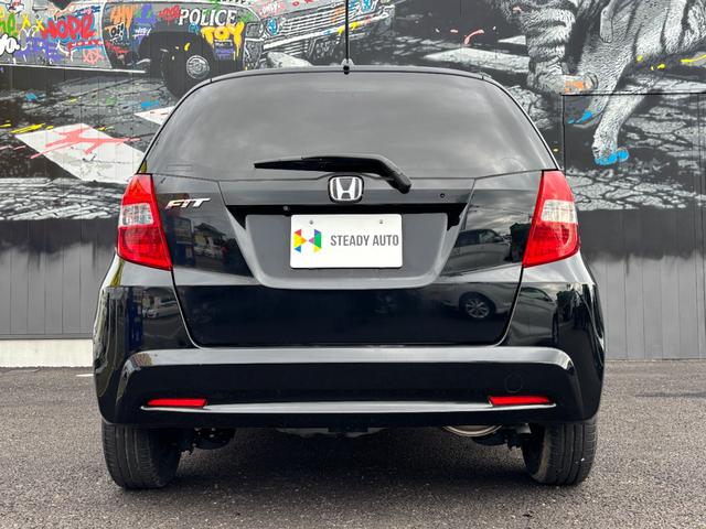 フィット 13G・スマートセレクション ファインスタイル 1年保証付 純正ナビ HIDヘッド 1オーナー車 地デジTV リアカメラ ビルトインETC 前後ドラレコ スマートキー オートライト 電格ミラー 運転席アームレスト ステアリングスイッチ 取説・保証書(31枚目)