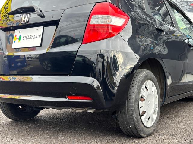 フィット 13G・スマートセレクション ファインスタイル 1年保証付 純正ナビ HIDヘッド 1オーナー車 地デジTV リアカメラ ビルトインETC 前後ドラレコ スマートキー オートライト 電格ミラー 運転席アームレスト ステアリングスイッチ 取説・保証書(35枚目)