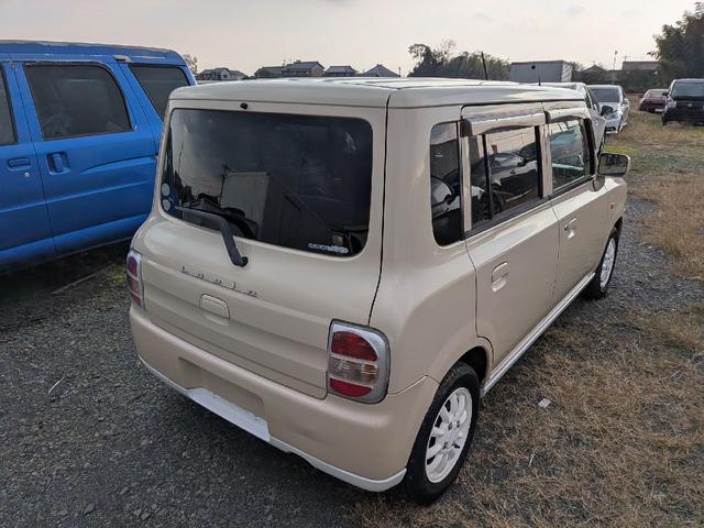 アルトラパン L タイミングチェーン 純正ホワイトアルミホイール 社外ナビ キーレスエントリー ベンチシート コラムオートマ エアコン パワーステアリング エアバック(8枚目)