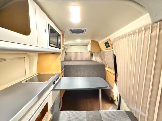 ハイエースバン 　トイファクトリー　バレイア　家庭用エアコン　ＦＦヒーター　冷蔵庫　電子レンジ　１５００Ｗインバーター　ＭＡＸファン　シンク　外部電源　アルパイン１１インチ　デジタルインナーミラー　セーフティセンス（6枚目）