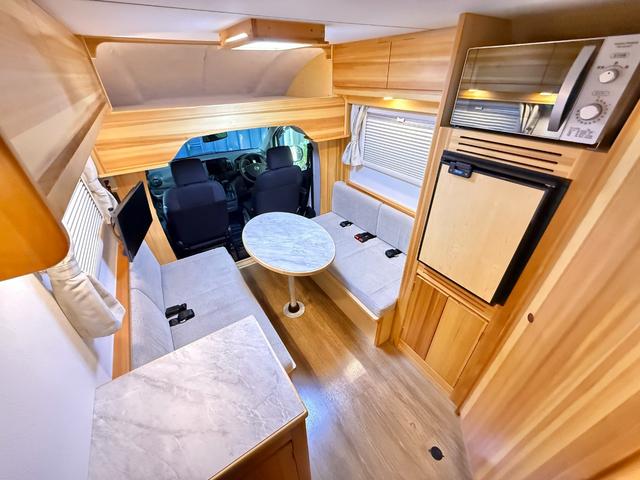 ＮＶ２００バネットバン 　ＡｔｏＺ　アルファ　ＦＦヒーター　テレビ　冷蔵庫　シンク　電子レンジ　マルチルーム　サイドオーニング　サブバッテリー走行充電　外部充電　給排水ポリタンク　ナビ　ＥＴＣ　ドラレコ　バックカメラ（9枚目）