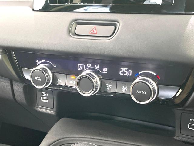 e:HEV X 登録済未使用車 ホンダセンシング アダプティブクルーズ LEDヘッド オートライト スマートキー バックカメラ 電動リアゲート オートエアコン プライバシーガラス(24枚目)