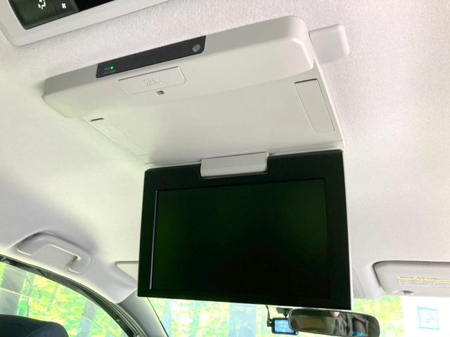 ヴォクシー ハイブリッドV 禁煙車 フリップダウンモニター 純正SDナビ 前席シートヒーター 置くだけ充電 電動スライドドア バックカメラ ドラレコ LEDヘッドライト ETC クルコン オートライト 純正15インチAW(3枚目)