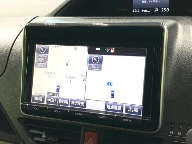 ヴォクシー ハイブリッドV 禁煙車 フリップダウンモニター 純正SDナビ 前席シートヒーター 置くだけ充電 電動スライドドア バックカメラ ドラレコ LEDヘッドライト ETC クルコン オートライト 純正15インチAW(4枚目)