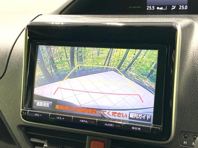 ヴォクシー ハイブリッドV 禁煙車 フリップダウンモニター 純正SDナビ 前席シートヒーター 置くだけ充電 電動スライドドア バックカメラ ドラレコ LEDヘッドライト ETC クルコン オートライト 純正15インチAW(5枚目)