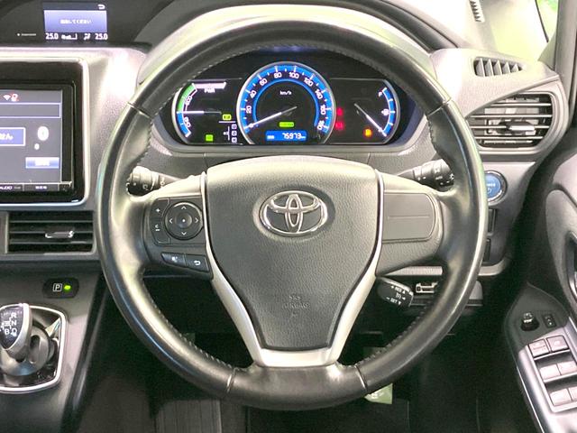 ヴォクシー ハイブリッドV 禁煙車 フリップダウンモニター 純正SDナビ 前席シートヒーター 置くだけ充電 電動スライドドア バックカメラ ドラレコ LEDヘッドライト ETC クルコン オートライト 純正15インチAW(14枚目)