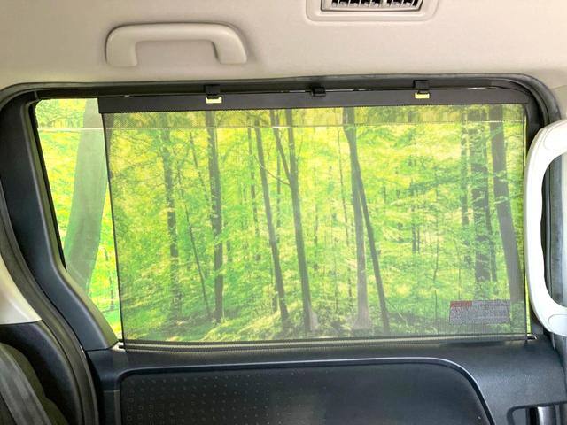 ヴォクシー ハイブリッドV 禁煙車 フリップダウンモニター 純正SDナビ 前席シートヒーター 置くだけ充電 電動スライドドア バックカメラ ドラレコ LEDヘッドライト ETC クルコン オートライト 純正15インチAW(36枚目)