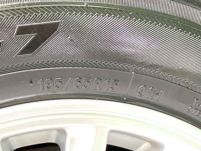 ヴォクシー ハイブリッドV 禁煙車 フリップダウンモニター 純正SDナビ 前席シートヒーター 置くだけ充電 電動スライドドア バックカメラ ドラレコ LEDヘッドライト ETC クルコン オートライト 純正15インチAW(65枚目)