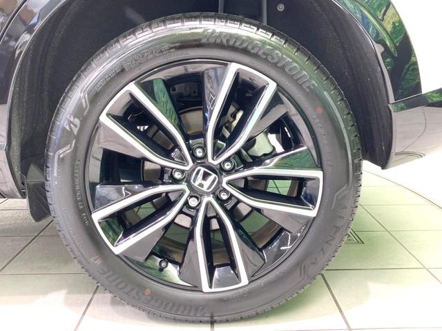 ヴェゼル e:HEV Z 禁煙車 純正9型ナビ 全周囲カメラ 衝突被害軽減システム レーダークルーズ BSM 電動リアゲート ハーフレザー ドラレコ ステアリングヒーター ETC2.0 オートライト デュアルエアコン(31枚目)