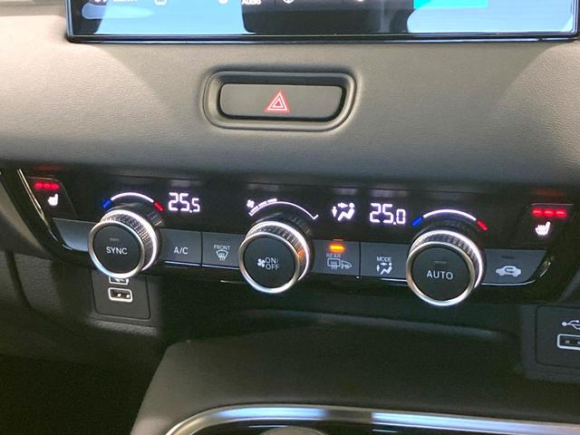 ヴェゼル e:HEV Z 禁煙車 純正9型ナビ 全周囲カメラ 衝突被害軽減システム レーダークルーズ BSM 電動リアゲート ハーフレザー ドラレコ ステアリングヒーター ETC2.0 オートライト デュアルエアコン(65枚目)