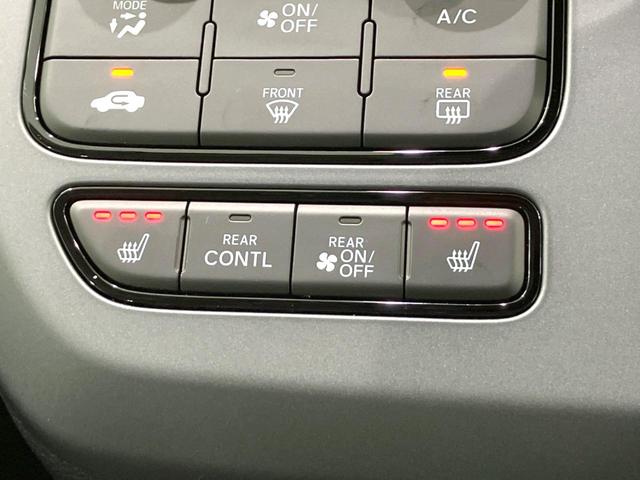 フリード e:HEVエアー EX 登録済未使用車 両側電動ドア 衝突被害軽減システム レーダークルーズ ハーフレザーシート コーナーセンサー スマートキー LEDヘッド 車線逸脱警報 オートライト オートエアコン(6枚目)