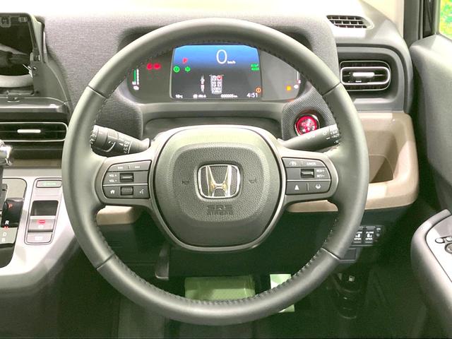 フリード e:HEVエアー EX 登録済未使用車 両側電動ドア 衝突被害軽減システム レーダークルーズ ハーフレザーシート コーナーセンサー スマートキー LEDヘッド 車線逸脱警報 オートライト オートエアコン(12枚目)