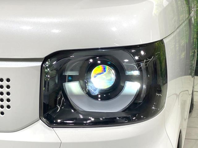 N-BOX ベースグレード 禁煙車 現行 電動スライドドア 衝突被害軽減システム レーダークルーズコントロール LEDヘッドライト オートハイビーム オートライト オートエアコン 車線逸脱警報 スマートキー(12枚目)