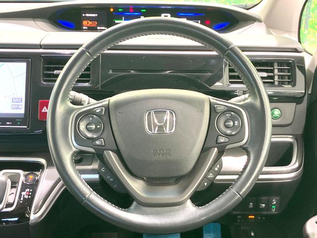 ステップワゴンスパーダ スパーダハイブリッド G・EX ホンダセンシング 禁煙車 両側電動ドア 純正9型SDナビ バックカメラ 衝突被害軽減システム レーダークルーズ ハーフレザー ドラレコ 前席シートヒーター LEDヘッド ビルトインETC オートライト デュアルエアコン(12枚目)