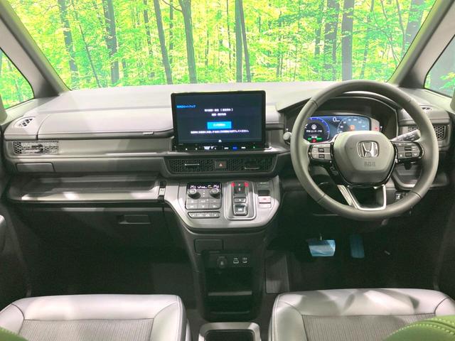 ステップワゴン e:HEVスパーダ 登録済未使用車 両側電動ドア 純正11.4型SDナビ バックカメラ 衝突被害軽減システム レーダークルーズ BSM 電動リアゲート ハーフレザー コーナーセンサー 前席シートヒーター LEDヘッド(2枚目)