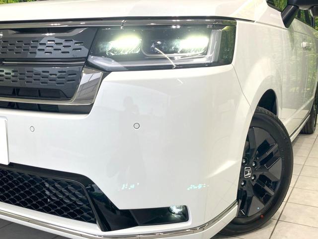 ステップワゴン e:HEVスパーダ 登録済未使用車 両側電動ドア 純正11.4型SDナビ バックカメラ 衝突被害軽減システム レーダークルーズ BSM 電動リアゲート ハーフレザー コーナーセンサー 前席シートヒーター LEDヘッド(12枚目)