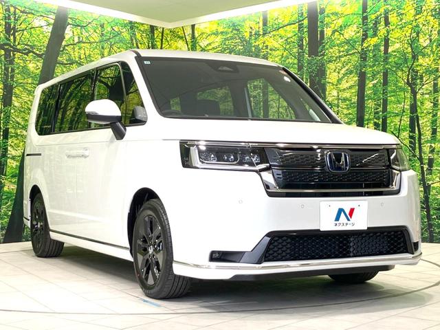 ステップワゴン e:HEVスパーダ 登録済未使用車 両側電動ドア 純正11.4型SDナビ バックカメラ 衝突被害軽減システム レーダークルーズ BSM 電動リアゲート ハーフレザー コーナーセンサー 前席シートヒーター LEDヘッド(16枚目)