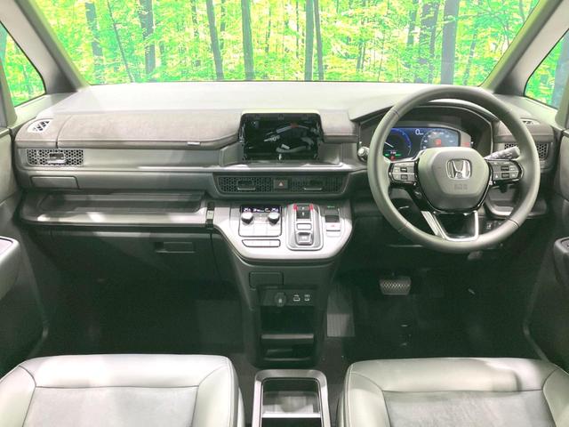 ステップワゴン e:HEVスパーダ プレミアムライン 登録済未使用車 両側電動ドア 衝突被害軽減システム レーダークルーズ BSM 電動リアゲート ハーフレザーシート コーナーセンサー 前席リアシートヒーター LEDヘッド オートライト デュアルエアコン(2枚目)