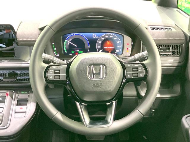 ステップワゴン e:HEVスパーダ プレミアムライン 登録済未使用車 両側電動ドア 衝突被害軽減システム レーダークルーズ BSM 電動リアゲート ハーフレザーシート コーナーセンサー 前席リアシートヒーター LEDヘッド オートライト デュアルエアコン(12枚目)