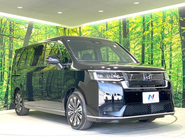 ステップワゴン e:HEVスパーダ プレミアムライン 登録済未使用車 両側電動ドア 衝突被害軽減システム レーダークルーズ BSM 電動リアゲート ハーフレザーシート コーナーセンサー 前席リアシートヒーター LEDヘッド オートライト デュアルエアコン(17枚目)