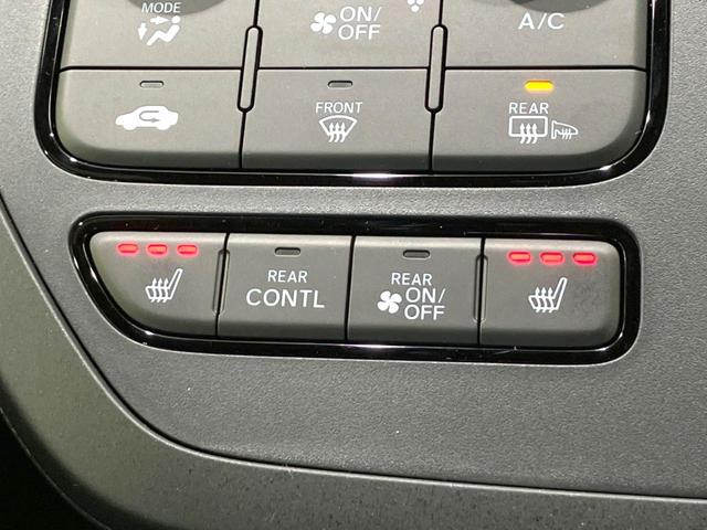 ステップワゴン e:HEVスパーダ プレミアムライン 登録済未使用車 両側電動ドア 衝突被害軽減システム レーダークルーズ BSM 電動リアゲート ハーフレザーシート コーナーセンサー 前席リアシートヒーター LEDヘッド オートライト デュアルエアコン(35枚目)