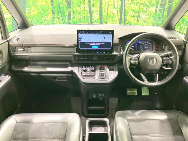 ステップワゴン ｅ：ＨＥＶスパーダ　プレミアムライン　禁煙車　両側電動ドア　純正１１．４型ＳＤナビ　後席モニター　全周囲カメラ　衝突被害軽減システム　レーダークルーズ　電動リアゲート　ハーフレザーシート　ドラレコ　コーナーセンサー　ＬＥＤヘッド（2枚目）