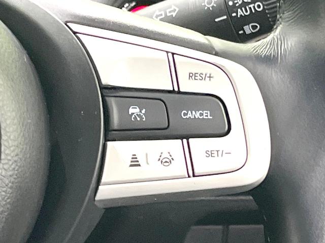 フィット e:HEVホーム 禁煙車 9インチナビ 全周囲カメラ 衝突被害軽減システム レーダークルーズ ハーフレザーシート ドラレコ コーナーセンサー スマートキー LEDヘッド ETC2.0 オートライト オートエアコン(6枚目)