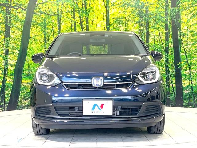 フィット e:HEVホーム 禁煙車 9インチナビ 全周囲カメラ 衝突被害軽減システム レーダークルーズ ハーフレザーシート ドラレコ コーナーセンサー スマートキー LEDヘッド ETC2.0 オートライト オートエアコン(14枚目)