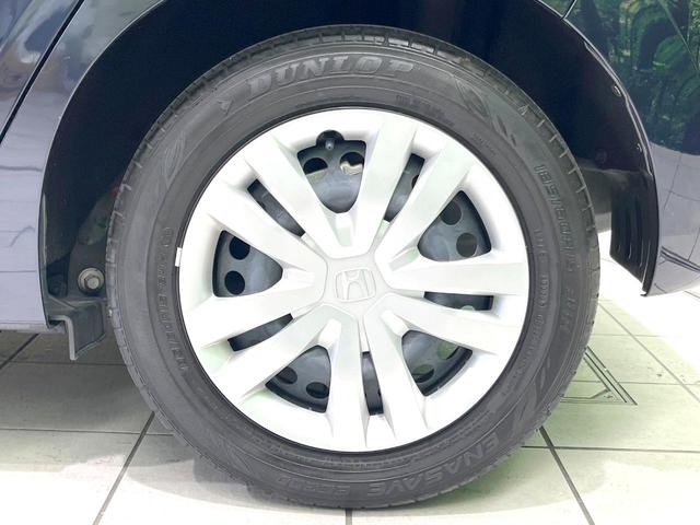 フィット e:HEVホーム 禁煙車 9インチナビ 全周囲カメラ 衝突被害軽減システム レーダークルーズ ハーフレザーシート ドラレコ コーナーセンサー スマートキー LEDヘッド ETC2.0 オートライト オートエアコン(30枚目)